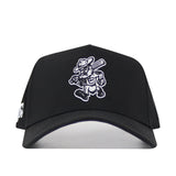 The No Rivals Texas A&M Ol' Sarge Baseball Hat in black features a white embroidered cartoon Ol' Sarge with a bat, hat, and boots on the front. Made from a polyester cotton blend, this snapback has a structured fit and plain white background.
