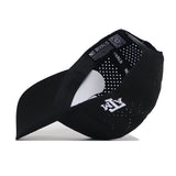 The Texas A&M Ol' Sarge Baseball Hat by No Rivals is shown angled to reveal the inside, with ventilation holes, “NO RIVALS” text, and a QR code on the inner band. Made from a polyester-cotton blend, “ATM” is stitched under the brim.