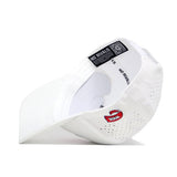 The WKU Golf Hat - White by No Rivals is shown upside down, highlighting black No Rivals branding inside, a QR code, and a small red patch with No Rivals on the outer side near the brim.