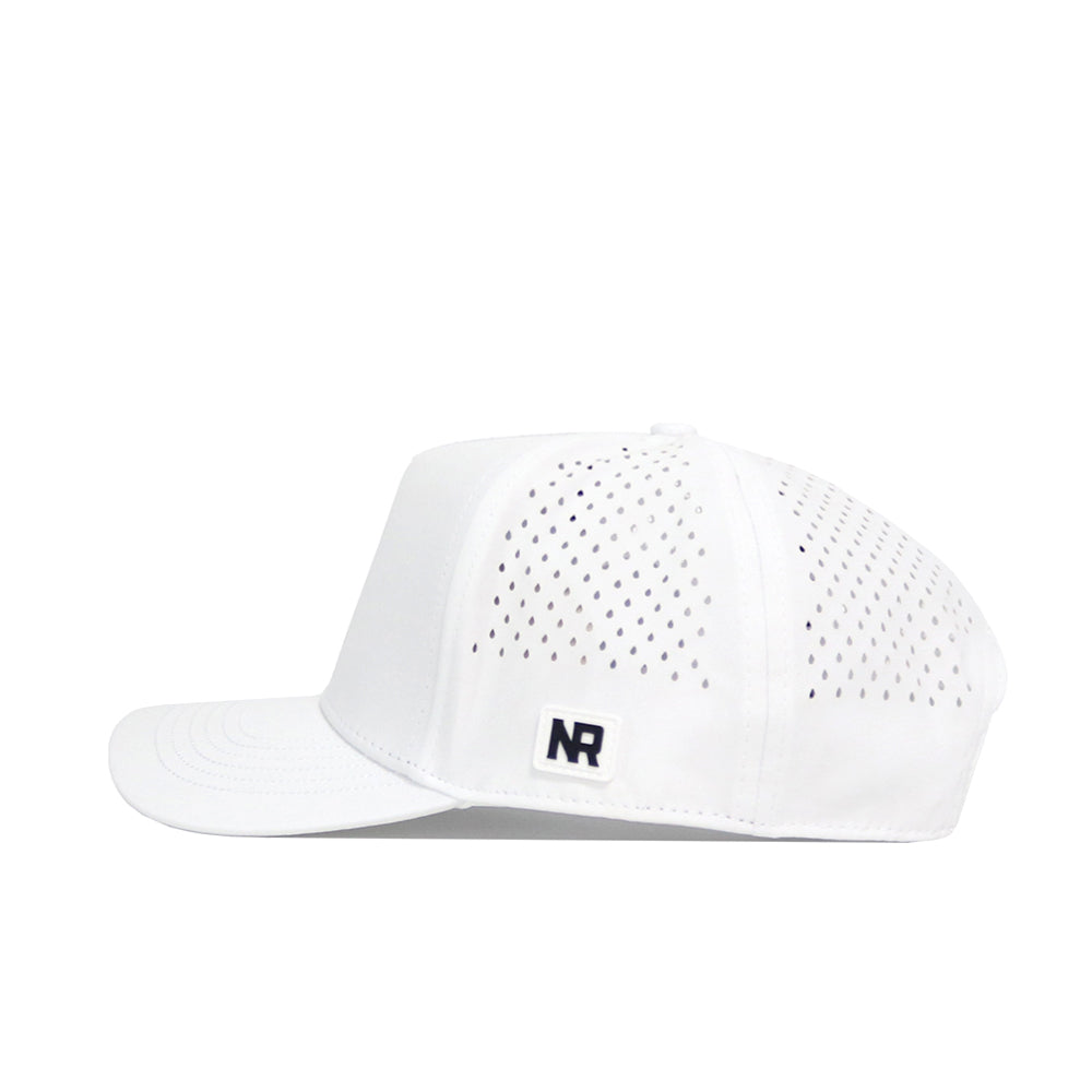 The No Rivals CSU Golf Hat - White is a premium structured cap with side ventilation holes, a small rectangular NR patch by the brim, and an adjustable snap back for a custom fit. Seen here in a side profile view.
