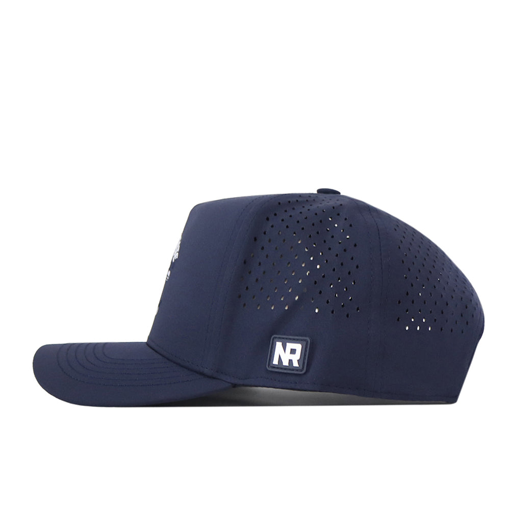 A navy Fresno State Golf Hat by No Rivals, shown in profile with perforated side panels and an NR logo patch on the side, crafted from high quality performance fabric for maximum comfort and durability.