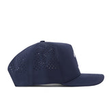 The Fresno State Golf Hat – Navy by No Rivals is displayed from the side, featuring small ventilation holes on the back half, a flat brim, and a snapback adjustment for a comfortable fit.