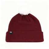 Introducing the Montana Grizzlies Logo Beanie by No Rivals: a maroon knit hat with a white pom-pom on top and a black folded brim patch featuring the NR initials, displayed on a white background—perfect for your next gameday look.
