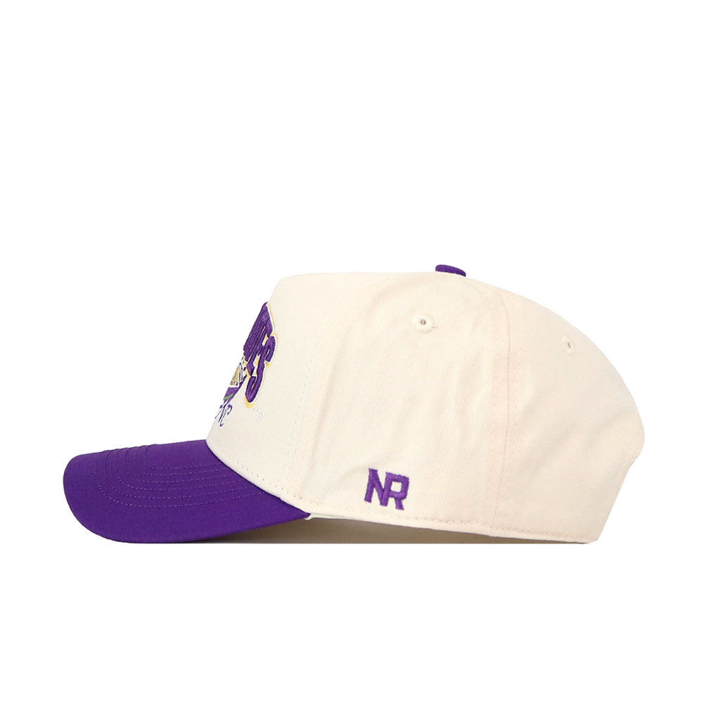 Introducing the ECU Pirates Stadium Hat by No Rivals—a structured fit baseball cap in white, featuring a purple brim and the letters "NR" embroidered in purple on the side. Crafted from high-quality cotton and shown from a side view.