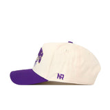 Introducing the ECU Pirates Stadium Hat by No Rivals—a structured fit baseball cap in white, featuring a purple brim and the letters "NR" embroidered in purple on the side. Crafted from high-quality cotton and shown from a side view.