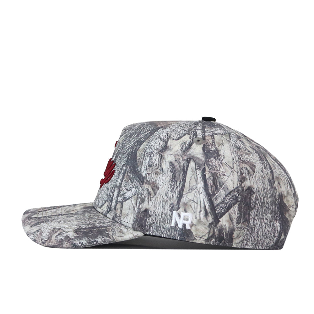 Introducing the Troy Outland Hat by No Rivals—a flat-bill cap showcasing a distinctive gray camouflage pattern. The front features bold red embroidered logo details, complemented by a white NR logo on the side. Designed for comfort and versatility, this hat includes an easy snap-back adjustment for a customized fit.