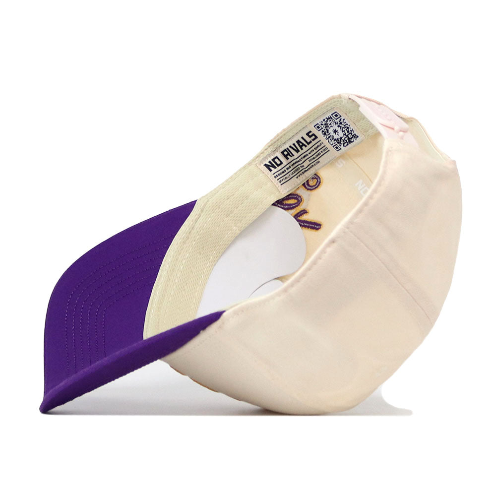 The ECU Pirates Halftime Hat by No Rivals is pictured upside down, showcasing the interior label that reads NO RIVALS alongside a QR code, embroidered logos, and detailed stitching—making it an ideal way to elevate your gameday fit.