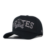 Introducing the No Rivals ECU Pirates Night Mode Hat, a black baseball cap showcasing "PIRATES" in sleek gray lettering and a bold skull and crossbones logo with ECU detailing. Crafted from high-quality cotton for durability, this structured snapback offers both comfort and standout style.