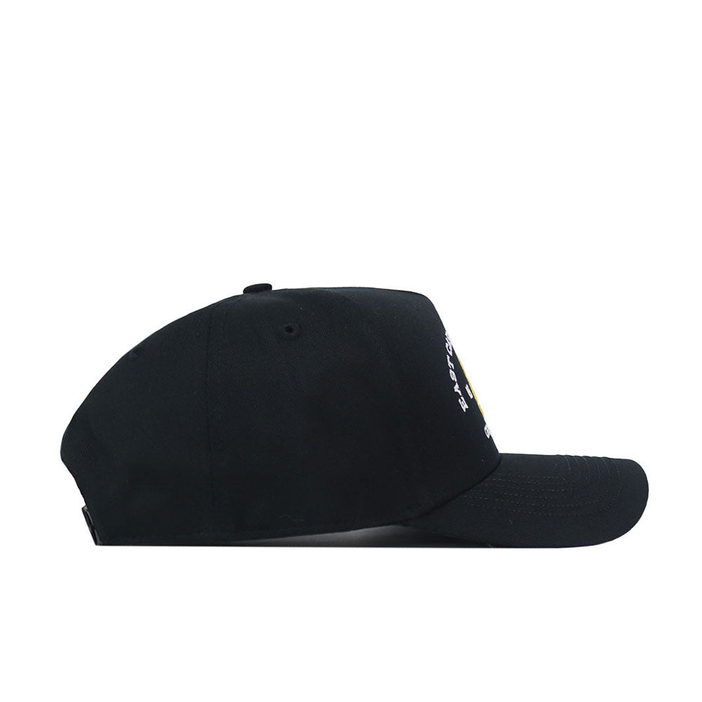 The No Rivals ECU Pirates Outlaw Hat in black is displayed laying flat on a white background, shown in a side profile view with the brim facing right. A small portion of the embroidered logo is visible on the front.