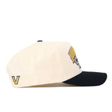Cream-colored No Rivals Vanderbilt Stadium Hat with a black brim, featuring an embroidered mascot on the side and a gold V logo near the back.