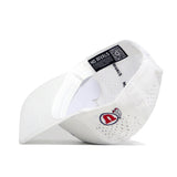 The Utah Golf Hat - White by No Rivals features a structured design, interior NO RIVALS label, and red-and-white embroidered crown logo—ideal for golf or as a standout snapback in your collection.