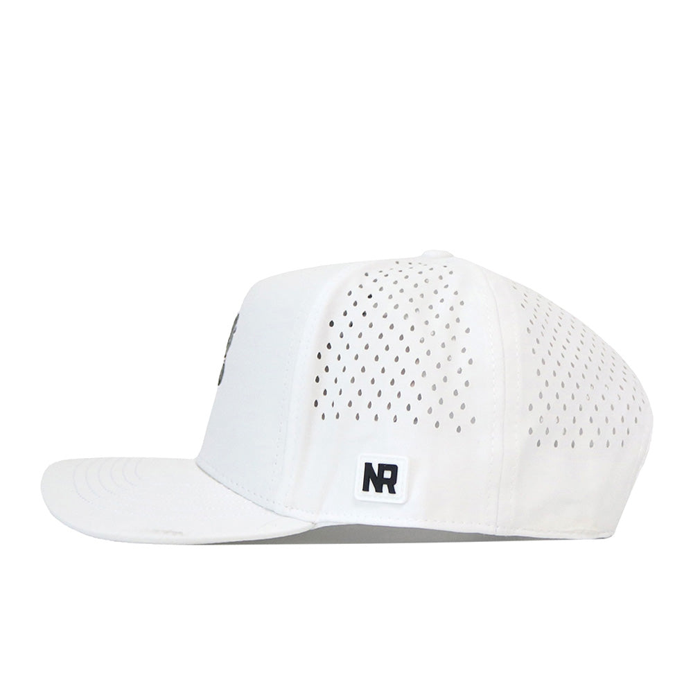 Side view of the Alabama Crimson Tide Football Mascot Hat in white performance fabric, featuring small ventilation holes on the back and sides. A black No Rivals embroidered logo patch is placed on the left side near the back, while a snap back adjustment provides a secure fit. The hat has a flat brim.