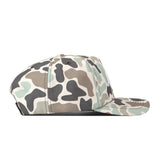 Introducing the Penn State Nittany Lions Huntsman Hat by No Rivals—a snapback hat featuring a green, brown, black, and beige camouflage pattern. Crafted from high-quality cotton and shown from the side against a white background, its structured fit ensures lasting comfort and style.