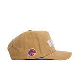 The No Rivals Boise State Rustic Hat is a tan cotton canvas snapback with "BOISE" embroidered in white on the front and a blue and orange horse logo on the side, shown from the left to highlight its structured fit.
