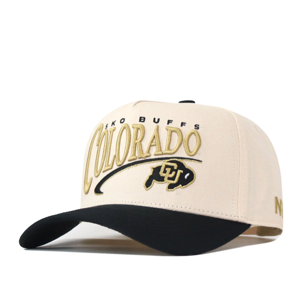 Show your team pride with the Colorado Buffaloes Stride Hat from No Rivals. This beige and black baseball cap features Colorado and the Colorado Buffaloes logo on the front, with “Niko Buffs” embroidered above. Crafted from high-quality cotton for comfortable wear, this structured fit snapback is perfect for any fan.