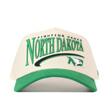The No Rivals North Dakota Fighting Hawks Stride Hat is a cream and green snapback featuring an officially licensed embroidered University of North Dakota Fighting Hawks logo on the front.