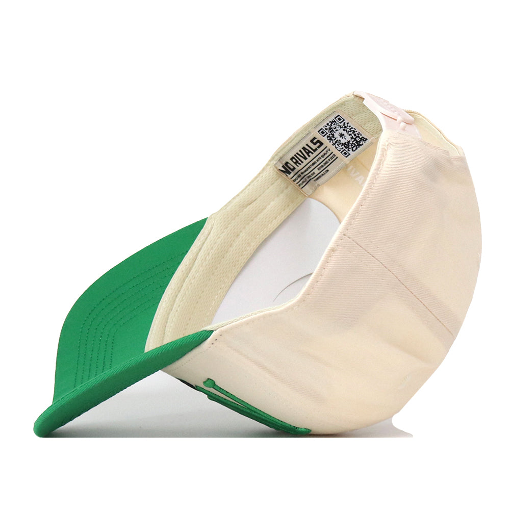 A green and beige North Dakota Fighting Hawks Stride Hat by No Rivals is turned inside out, revealing the white inner lining and a label with text and a QR code. The hat features a green, slightly curved brim. This officially licensed snapback demonstrates quality craftsmanship, making it ideal for casual wear or as a collectible.
