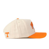Side view of the Tennessee Volunteers Neyland Checkard Hat by No Rivals, featuring a cream-colored crown, orange brim, an embroidered orange T logo on the side, and a classic snapback design—perfect for your gameday fit.