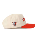 No Rivals’ Bowling Green State Falcons | Upside Down Falcons Hat - Classic Colors is a cream-colored snapback baseball cap with a red brim. The side displays a BG logo with a falcon head, representing the Bowling Green State Falcons, while orange text appears on the front (partially visible from the side view).