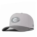 The Georgia Graphite Hat by No Rivals is a light gray baseball cap with a curved brim, showcasing a large embroidered G logo on the front and NR initials on the side—an ideal gameday fit.