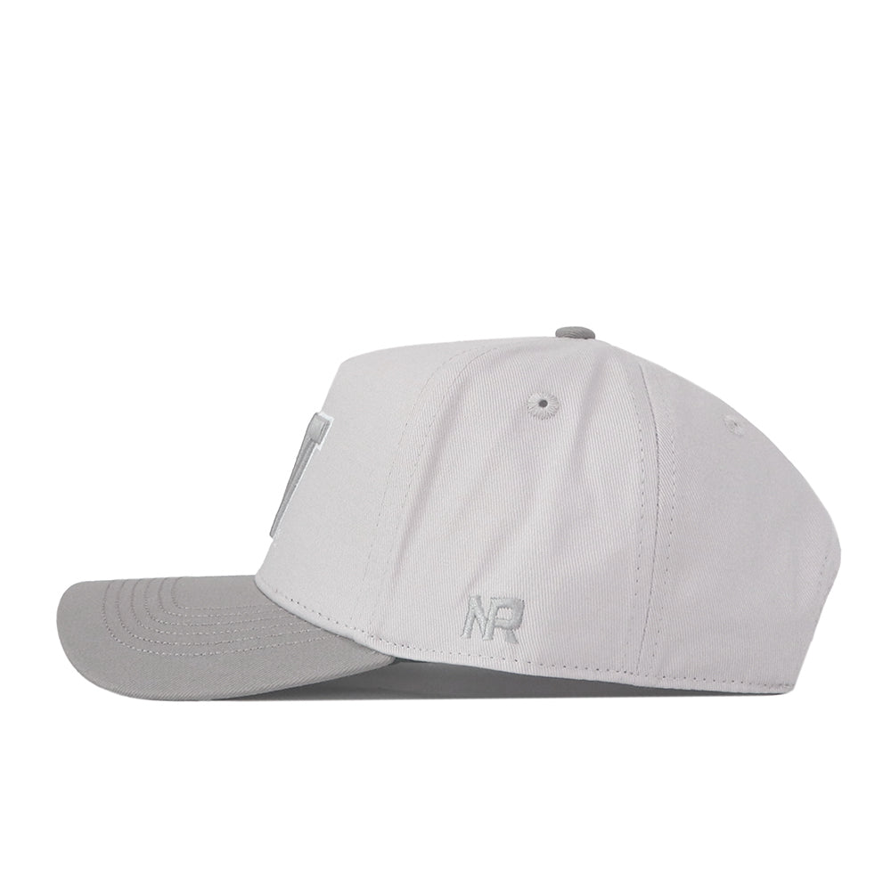 A graphite Washington Huskies hat by No Rivals, featuring a slightly darker gray brim and subtle stitching, is shown in side view. A small embroidered logo near the back adds the perfect finishing touch for your Gameday Fit.