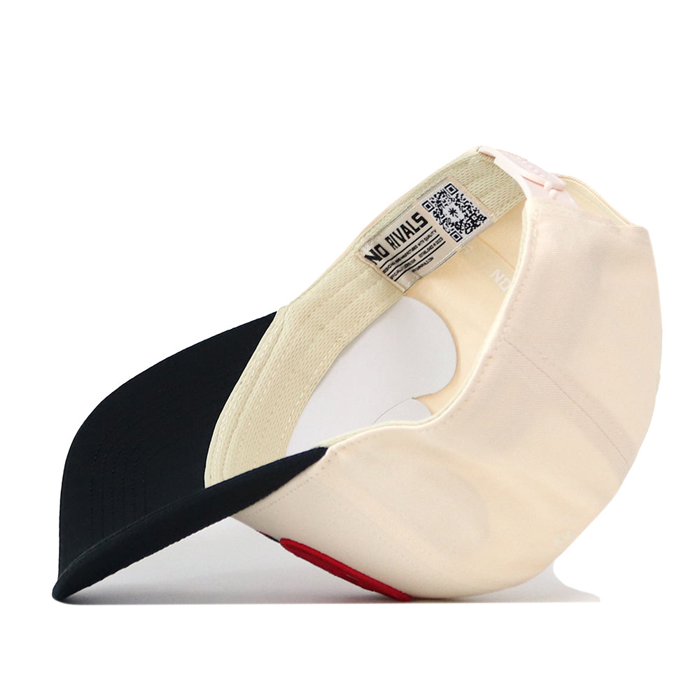 A cream and black No Rivals Georgia Bulldogs Stride Hat is shown upside down, displaying the interior tags, a QR code label inside the brim, and its structured fit crafted from high quality cotton.