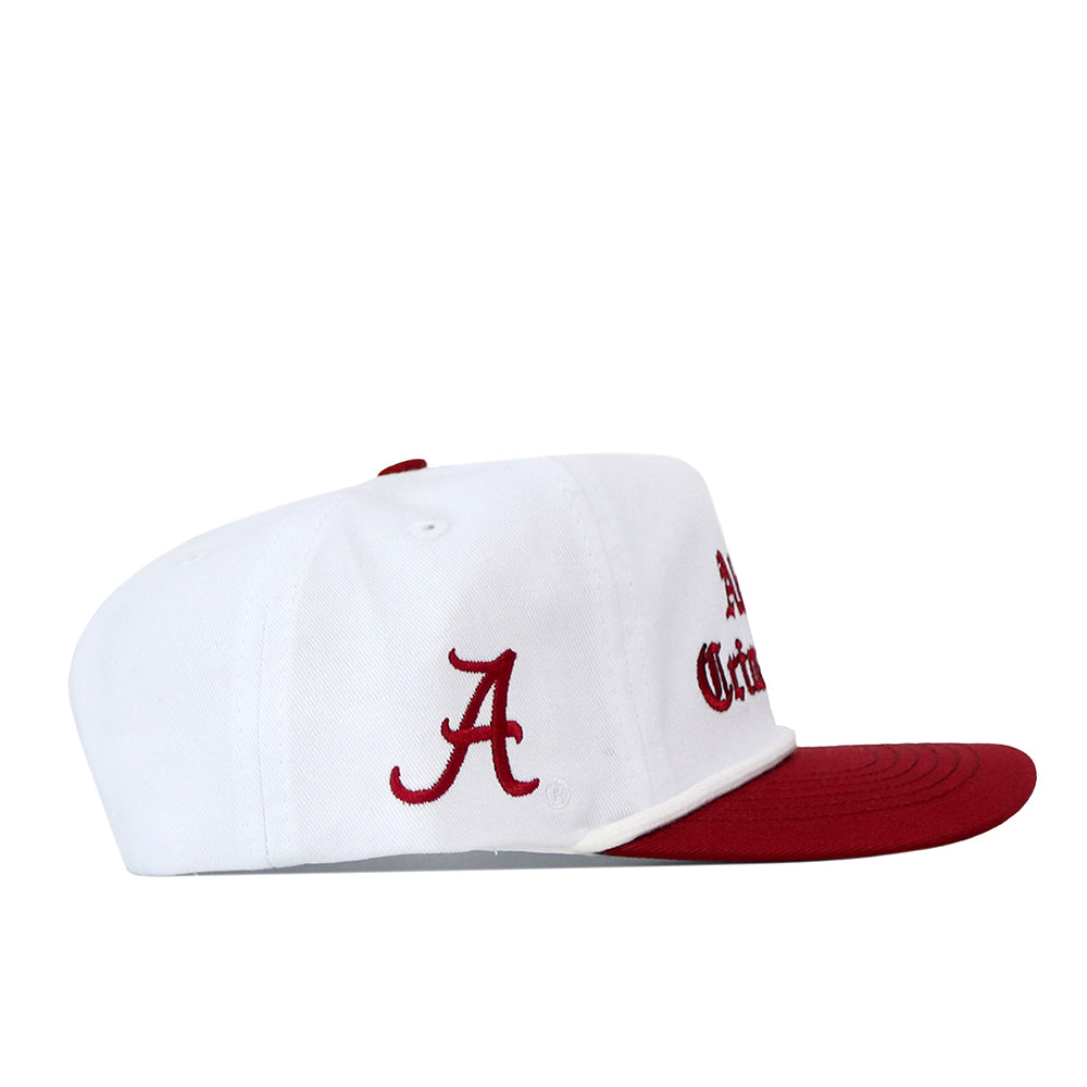 No Rivals Alabama Old English Rope Hat, a white 5-panel baseball cap with a red brim, a red script letter A on the side, red Old English-style lettering on the front, and a snapback adjustment.