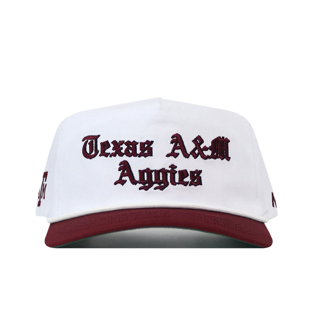 Texas A&M Old English Rope Hat, a white 5-panel cap with a maroon brim, maroon Old English text, a maroon rope at the base of the crown, and a snapback adjustment.