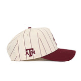The No Rivals Texas A&M Ol' Sarge Baseball Hat features cream snap back styling, thin maroon pinstripes, a maroon brim, side ATM logo embroidery, and is made from a comfy polyester cotton blend for a structured fit.