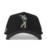 Introducing the USF Golf Hat - Black by No Rivals: a sleek snapback hat adorned with an embroidered cartoon bull playing golf in green and gold accents. The design features a plain brim and a signature green bull head logo stitched on the left side—perfect for elevating your next gameday look.