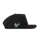 The No Rivals USF Golf Hat - Black features ventilation holes and a bold green and gold embroidered bull logo on the side. This classic gameday snap back is showcased from a side view against a white background.