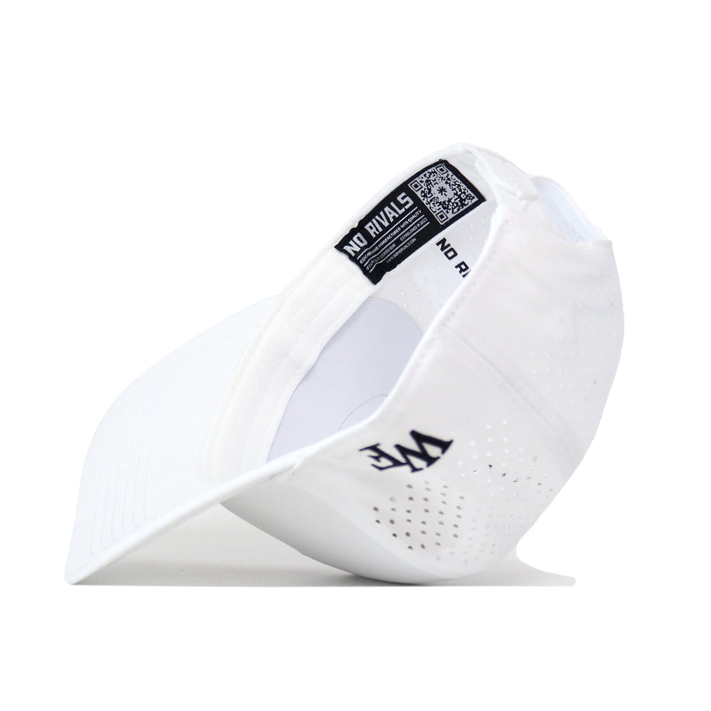 Side view of the Wake Forest Golf Hat - White by No Rivals, featuring perforated white athletic fabric, a curved brim, and an embroidered WE logo on the side. The interior displays a NO RIVALS label alongside a QR code. Expertly crafted for ultimate gameday comfort and fit.