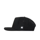 Show off your gameday style with the No Rivals Wake Forest Golf Hat in black. This flat-brim snapback features small ventilation holes on the side and a square embroidered NR logo patch in white and gray on the side panel. Displayed here in a side profile view, it’s the perfect accessory for any outfit.