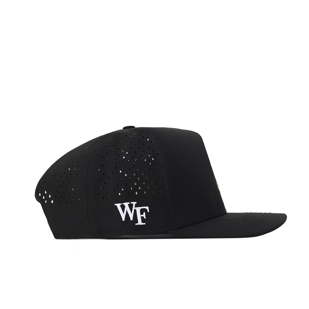 No Rivals Wake Forest Golf Hat - Black, featuring a flat brim, side ventilation holes, and a white embroidered "WF" logo on the left side. This classic snapback is displayed in a side profile against a white background—delivering the perfect Gameday Fit.