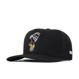 Show your Deacon pride with the Wake Forest Golf Hat in black from No Rivals. This snapback features an embroidered cartoon figure holding a bat on the front, making it perfect for your gameday fit. A small NR patch on the side adds a signature detail.