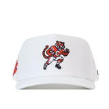 The Clemson Tigers Football Mascot Hat - White by No Rivals features an embroidered cartoon tiger in a jersey with a “C” on its chest, running across the center front panel. Crafted from performance fabric, this white baseball cap is finished with a classic snap back for an adjustable fit.