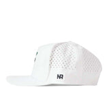 A white Florida Gators Football Mascot Hat by No Rivals is shown from the side. Crafted from performance fabric, this flat brim snapback features a small black and white “NR” embroidered logo patch above the brim on the left side.