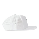 The Fresno State Golf Hat - White by No Rivals is a white snapback baseball cap displayed from the side, featuring small ventilation holes on the back and side panels, a flat brim, and an embroidered logo on the front.
