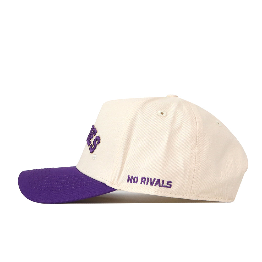 A cream-colored Right Side Up Huskies Hat - UW - Classic by No Rivals, featuring a purple brim and “NO RIVALS” embroidered in purple on the side above the brim. The hat includes a convenient Snap Back Adjustment for a customizable fit.