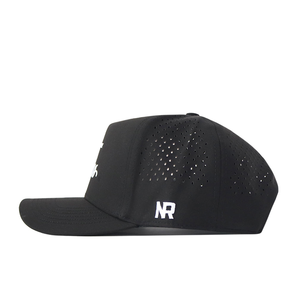 The Tarleton Athletic Legacy Hat by No Rivals is a black baseball cap with small ventilation holes on the side panels and a white NR logo embroidered above the left ear. Displayed in a side view against a white background, this premium athletic hat features a sleek snap back closure for a customized gameday fit.