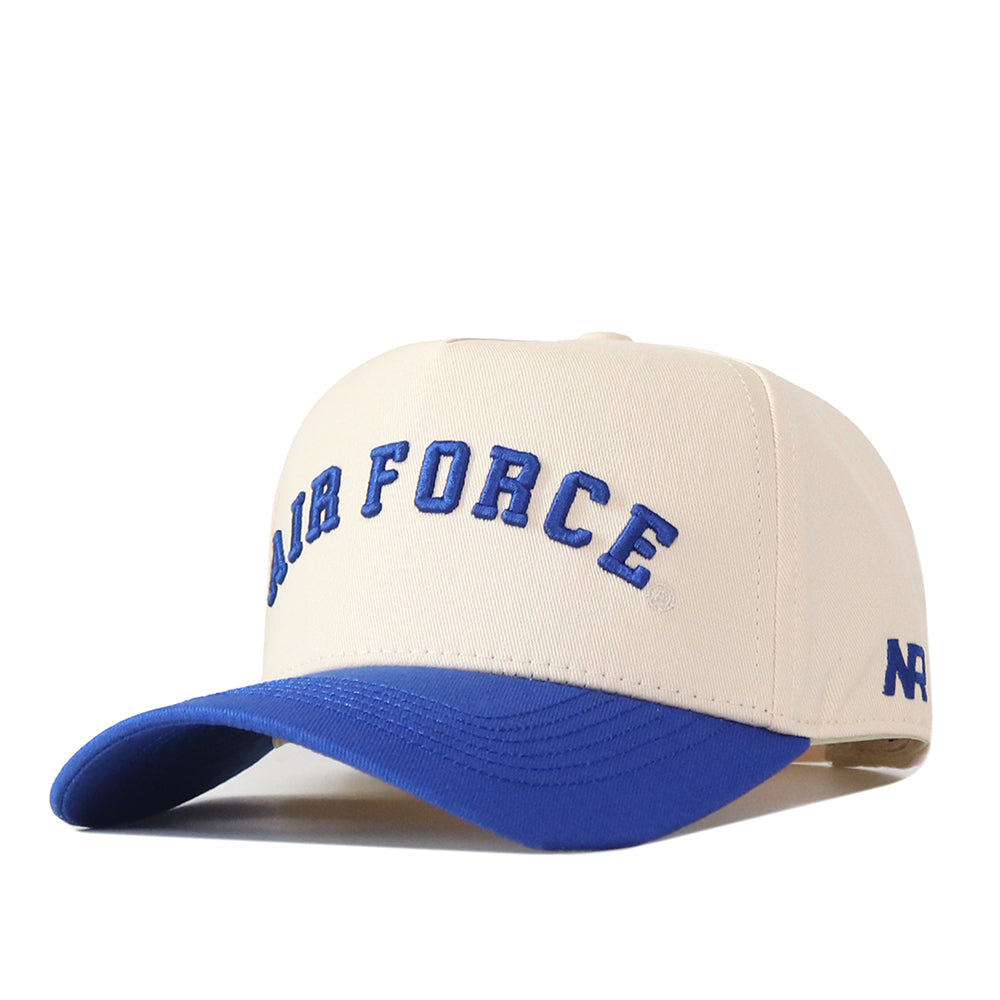 The No Rivals Right Side Up Air Force Hat - Classic Colors is a beige and blue snapback featuring “AIR FORCE” embroidered in blue letters on the front, an official embroidered logo, and “AF” on the left side.