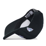 A black No Rivals FIU Panthers | Upside Down Miami Hat - Blackout snapback is flipped upside down, displaying its inner labels, a QR code, and an embroidered bulldog logo on the side—echoing the iconic style of an inside-out Miami or FIU Panthers cap.