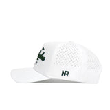 The North Carolina Clubhouse Hat by No Rivals is a white snapback made from a polyester-cotton blend. It has small side ventilation holes, a structured fit, and features dark green NR embroidery near the back and a partially visible front logo.