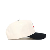 The Scheels Texas Hat - Black is a structured fit cap with a black curved brim, crafted from high-quality cotton and shown from the side against a white background.