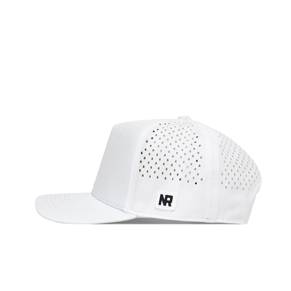 The No Rivals USF Golf Hat - White is a snapback cap featuring a flat brim, side ventilation holes, and a small black and white embroidered NR logo patch on the left panel. Designed with an adjustable snap back for the perfect gameday fit, the hat is displayed in profile, facing left against a plain white background.