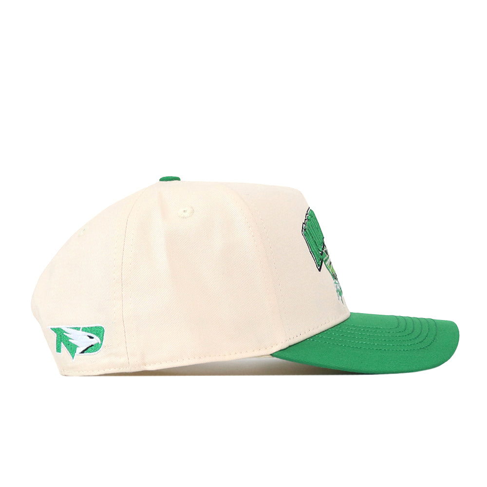 The North Dakota Fighting Hawks Stadium Hat by No Rivals is a cream-colored snapback with a green visor, displayed here in a side view. It features a green embroidered logo on the side and an additional front design that’s partially visible—making it the perfect addition to your gameday fit.