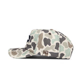 A side view of the No Rivals North Dakota Huntsman Hat in duck camo with beige, green, brown, and black shades, featuring a 5-panel design and NR embroidery on the side.
