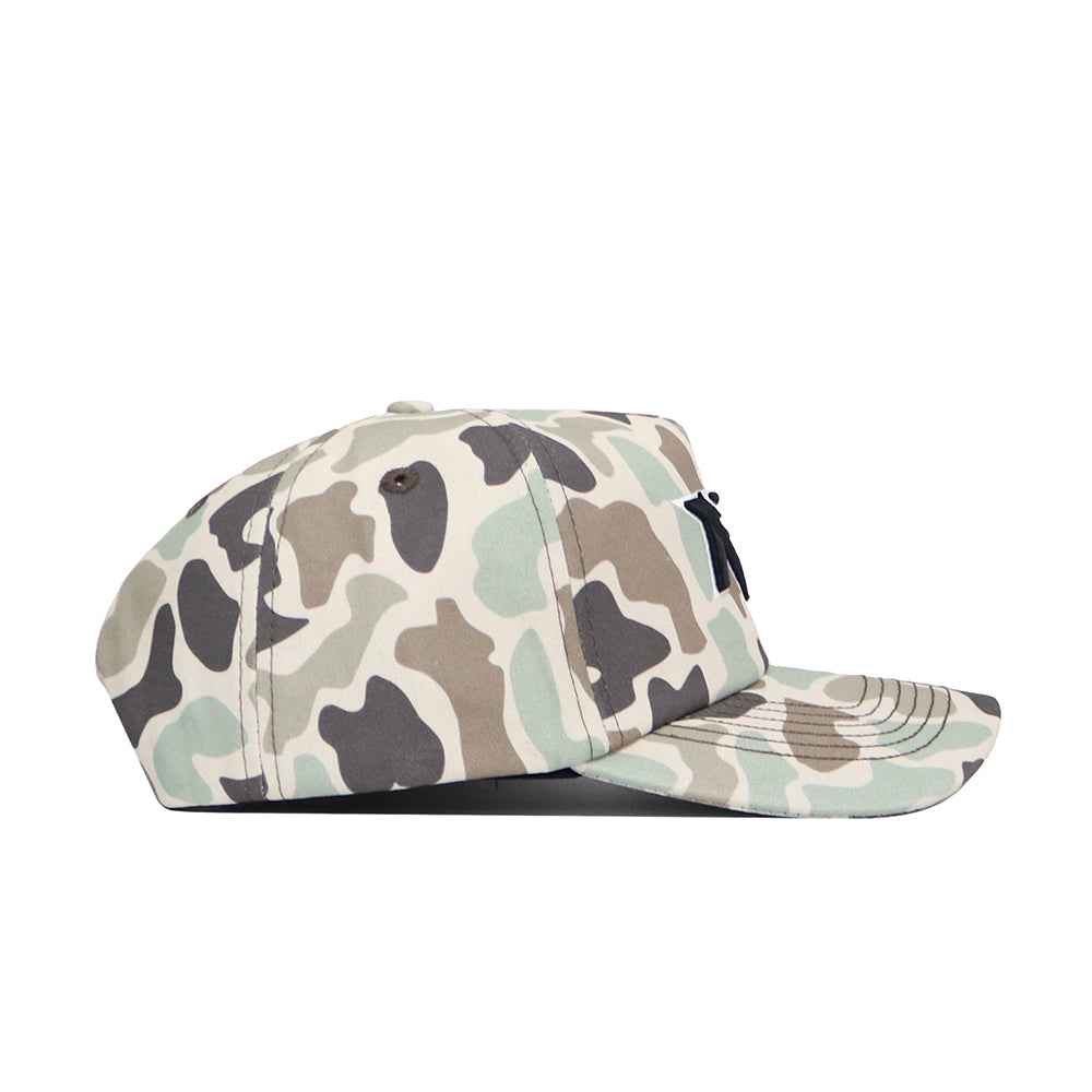 Side view of the No Rivals North Dakota Huntsman Hat, a 5-panel duck camo cap in green, tan, and brown with a flat brim, snapback closure, and small black front logo.