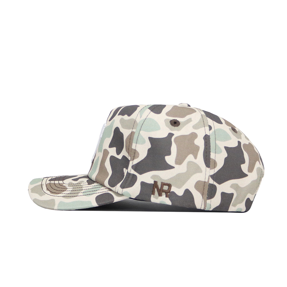 A side view of the Tennessee Huntsman Hat by No Rivals, featuring green, tan, and brown duck camo and “NR” embroidered in brown on the side. Comes with a classic snapback for adjustable fit.