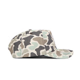 A side view of the No Rivals Tennessee Huntsman Hat, a 5-panel duck camo hat with a snapback closure, featuring green, brown, beige, and black camouflage pattern on a white background.